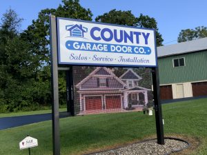 county garage door co sign outside office location