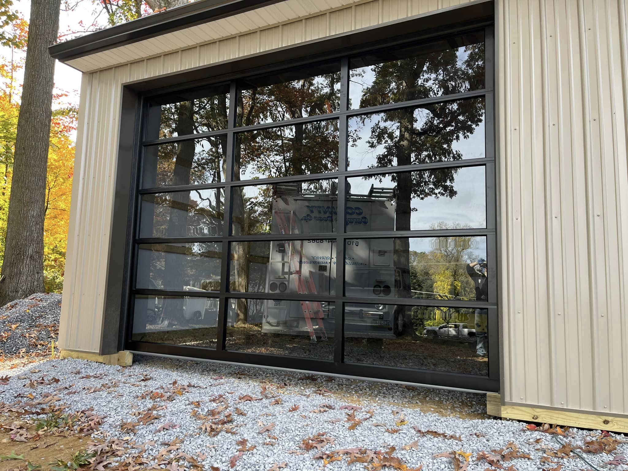 newly installed glass garage door in a custom home